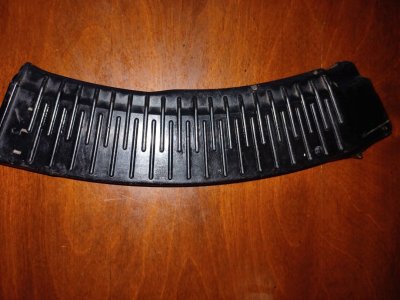Molot ribbed 45 round black w plum follower.good condition