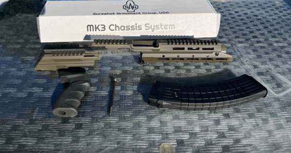 Sureshot mk3 chassis, circle 10 45rd mag,and ak12 clone grip