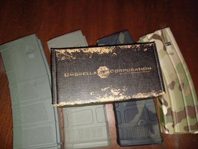 Elusive foilage green umbrella corp. grip..1 mft foilage 30 rd mag..1foilage green cerokoted magpul 30 rd..1 multicam hd tapco 30 rd mag.1 bmc magpul