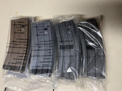 8 USGI mags new in wrapper.